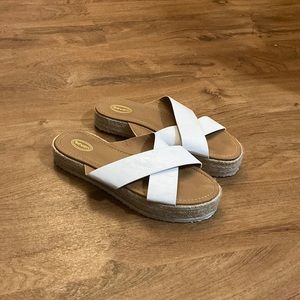 White slip on sandals. Size 9.